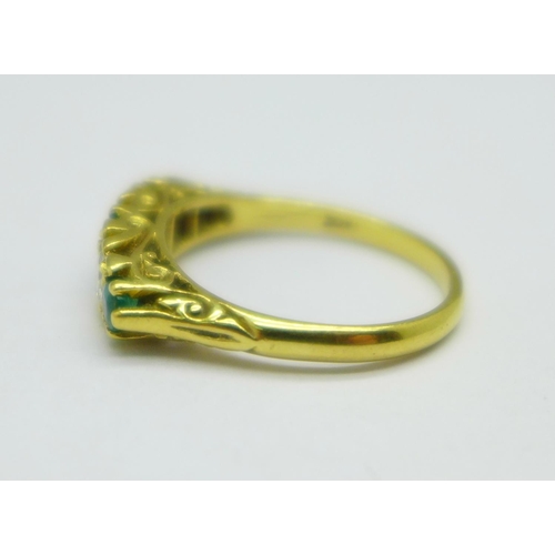 1029 - An 18ct gold, emerald and diamond ring, 4.2g, O