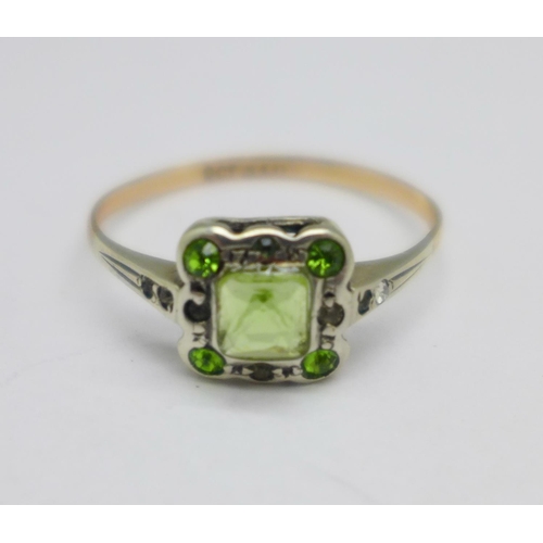 1036 - A 9ct gold and silver, green and white stone cluster ring, P