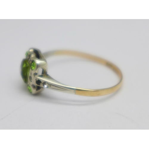 1036 - A 9ct gold and silver, green and white stone cluster ring, P