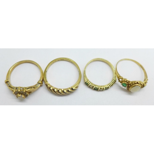 1041 - Four 9ct gold rings, two set with opals, total weight 9.1g, M, 2x P and S