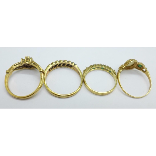 1041 - Four 9ct gold rings, two set with opals, total weight 9.1g, M, 2x P and S