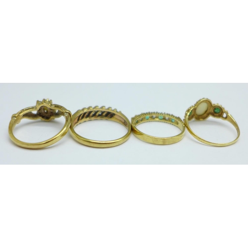 1041 - Four 9ct gold rings, two set with opals, total weight 9.1g, M, 2x P and S