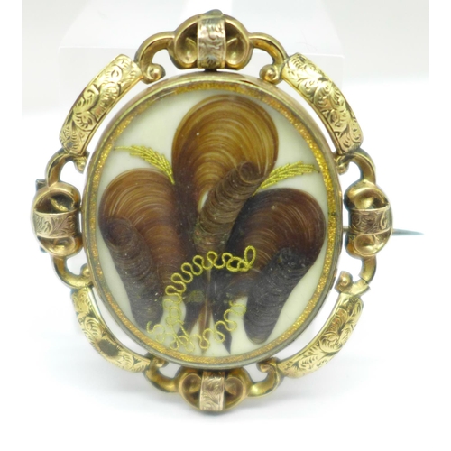 1042 - A Victorian swivel photograph brooch, width 39mm