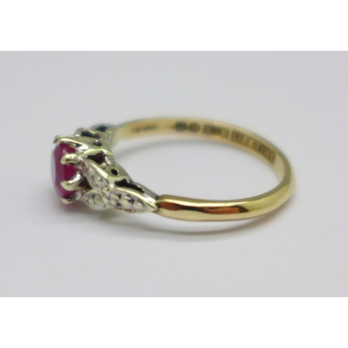 1057 - A 9ct gold and ruby solitaire ring, 2g, K