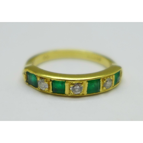 1058 - An 18ct gold, emerald and diamond ring, 4.1g, N