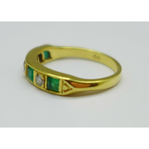 1058 - An 18ct gold, emerald and diamond ring, 4.1g, N