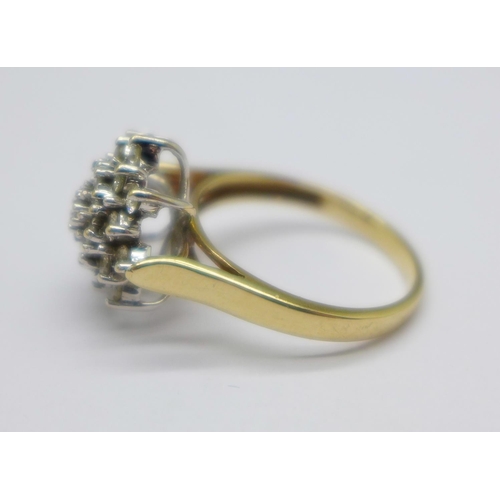 1074 - A 9ct gold, twenty-five stone diamond cluster ring, 4.9g, S