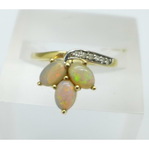 1084 - A 9ct gold, opal and diamond ring, 2.2g, L