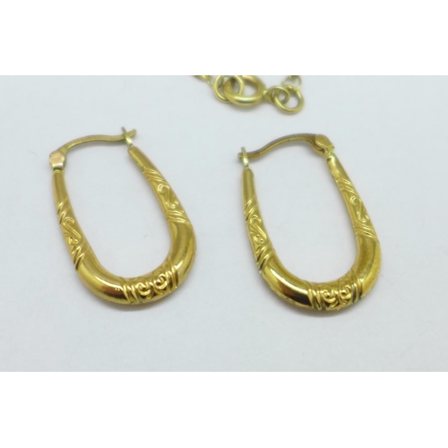 1094 - A fine 9ct gold chain and a pair of 9ct gold earrings, 2.8g