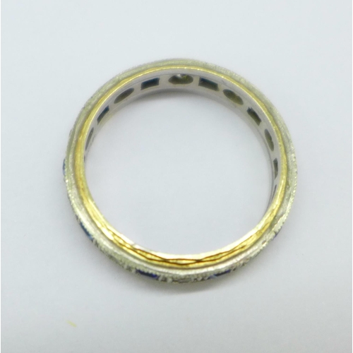 1097 - A 9ct gold, blue and white stone eternity ring, 3.1g, O