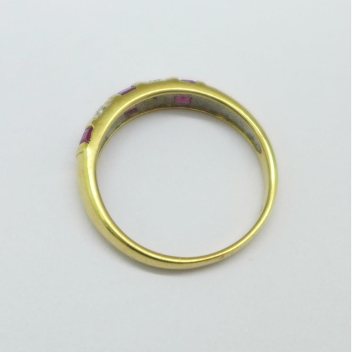 1098 - A 9ct gold, ruby and diamond ring, 2.2g, O