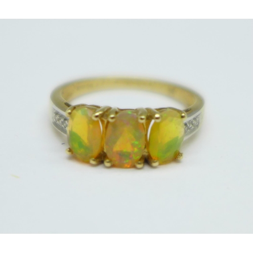 1099 - A 9ct gold and synthetic opal ring, 1.8g, J