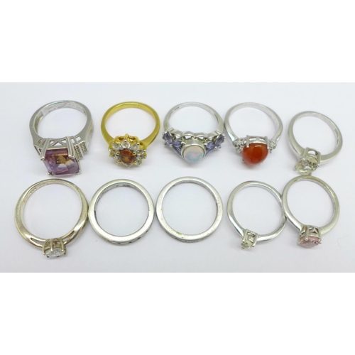 1100 - Ten silver rings