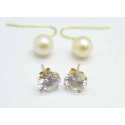 1109 - A yellow metal and cultured pearl earrings and a pair of 9ct gold studs