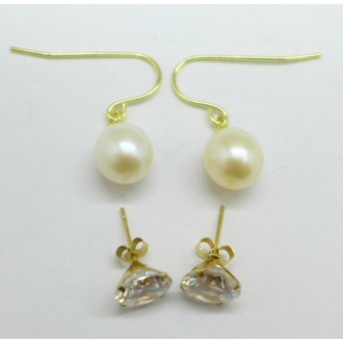 1109 - A yellow metal and cultured pearl earrings and a pair of 9ct gold studs