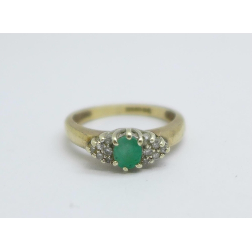 1119 - A 9ct gold, emerald and diamond ring, 2.6g, M