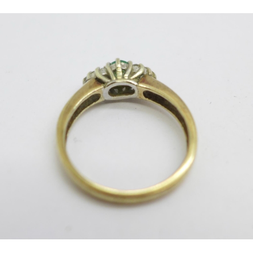 1119 - A 9ct gold, emerald and diamond ring, 2.6g, M