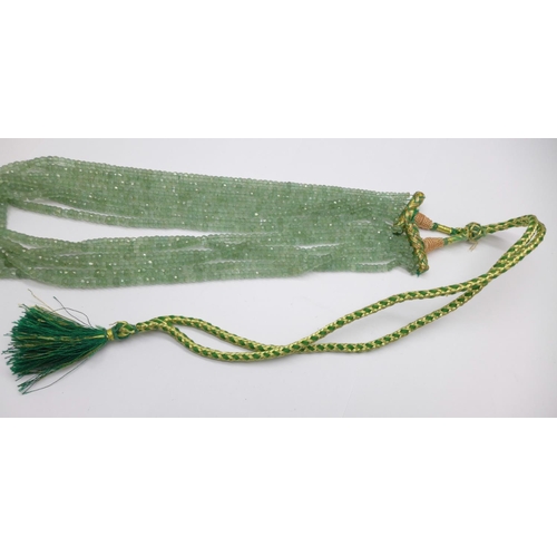 1131 - A green aventurine gemstone bead necklace with textile thread