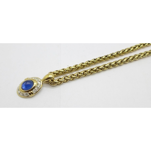 1132 - A gilt necklace and pendant, 45cm