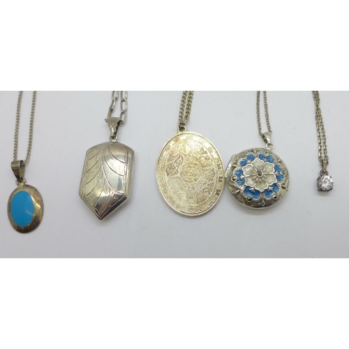 1135 - Three silver pendants, two silver lockets and five silver chains, and a small clown pendant with cha... 