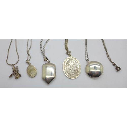 1135 - Three silver pendants, two silver lockets and five silver chains, and a small clown pendant with cha... 