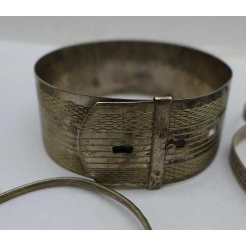 1153 - Four silver bracelets and five silver bangles, 107g