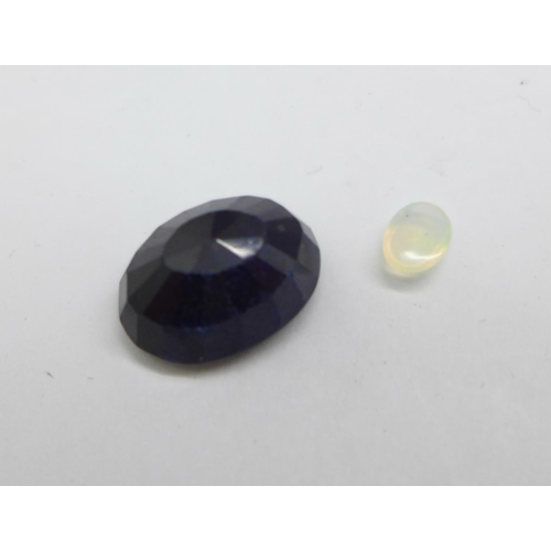 1154 - Two unmounted gemstones, blue sapphire, 15.50ct, and opal, 0.39ct, certified