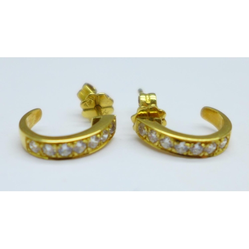 1161 - A pair of yellow metal earrings, the fasteners marked 750, 3.1g