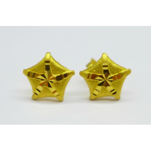 1162 - A pair of 22ct gold earrings, the fasteners marked 916, 2.4g