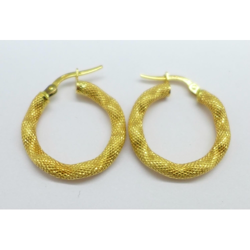 1163 - A pair of 18ct gold hoop earrings, 2.4g