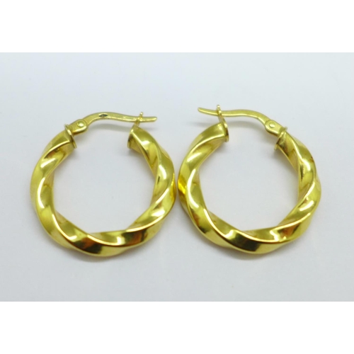 1167 - A pair of 18ct gold earrings, marked 750, 3.4g