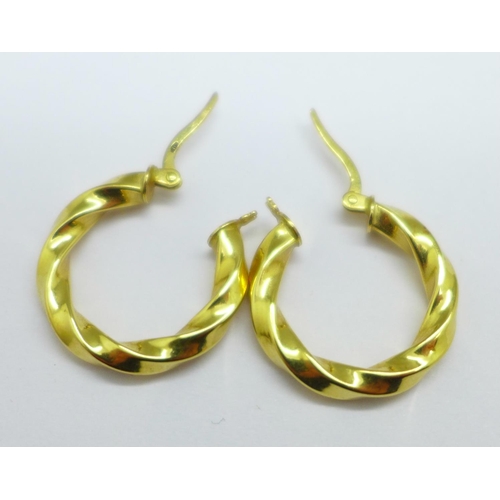 1167 - A pair of 18ct gold earrings, marked 750, 3.4g