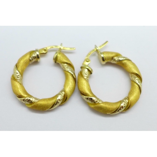 1168 - A pair of 18ct gold hoop earrings, marked 750, 5.7g