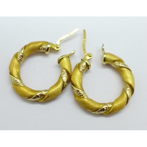 1168 - A pair of 18ct gold hoop earrings, marked 750, 5.7g