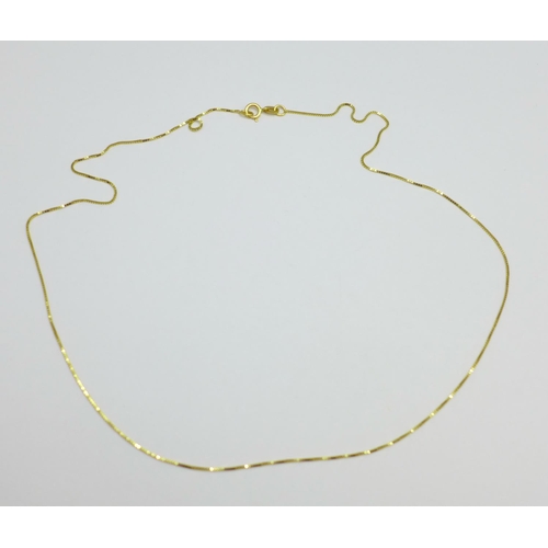 1169 - A fine 18ct gold chain, 1.3g, 38cm