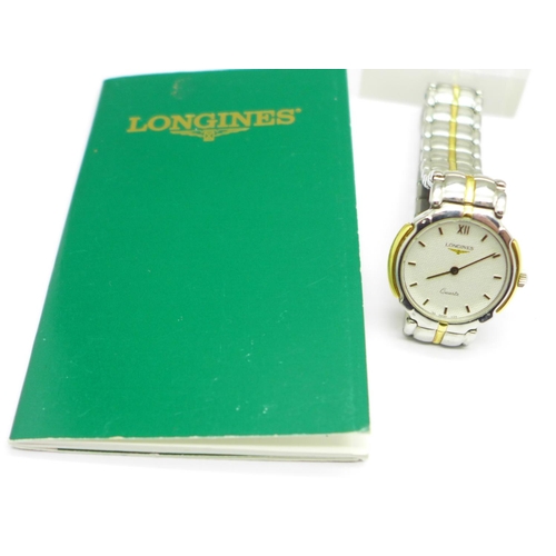 1173 - A lady's Longines wristwatch, (paperwork not matching)