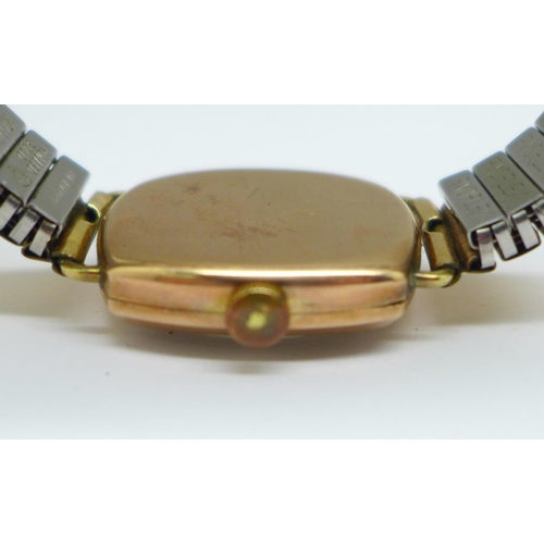 1175 - A 9ct gold cased wristwatch, Thomas Russell & Son, London 1945, on a Fixoflex bracelet strap, 28mm c... 