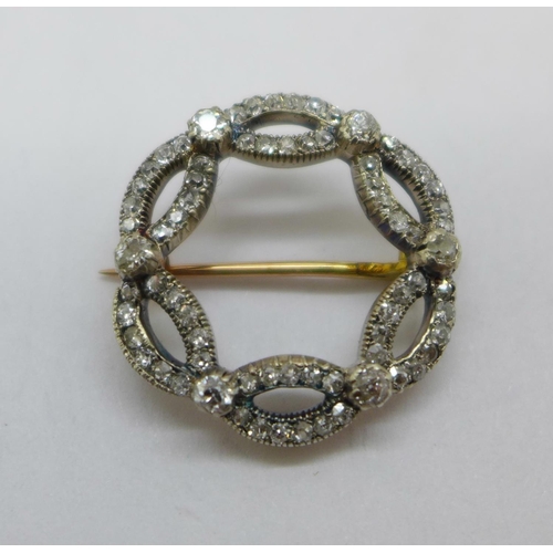 1182 - An early Victorian diamond set brooch, 22mm, (gold back and silver settings)