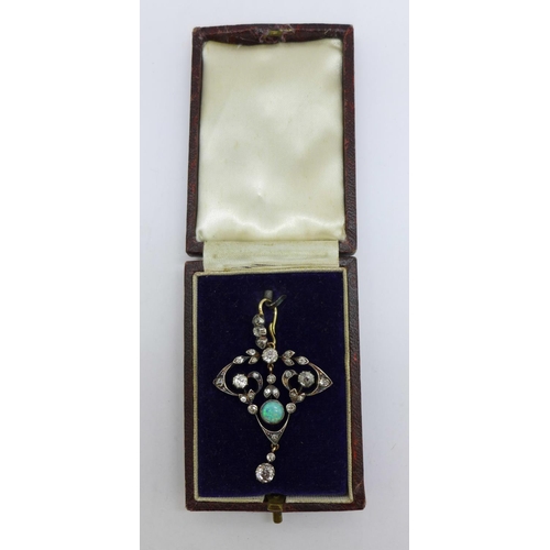 1187 - A Victorian opal and diamond pendant, 33mm wide, (gold back and silver settings)