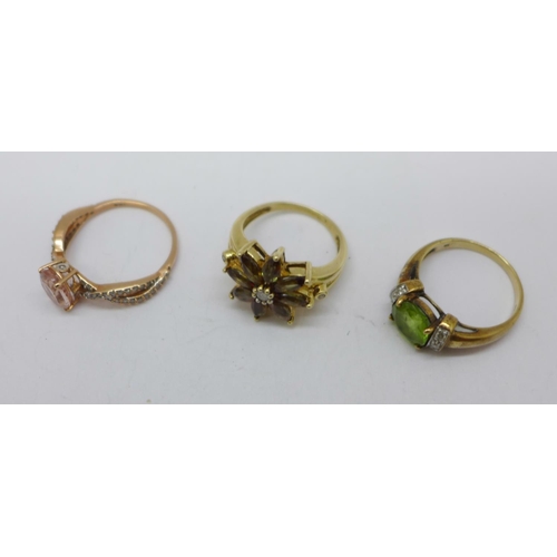 1189 - Three 9ct gold rings, two set with diamonds, 10.1g, 2x N and S