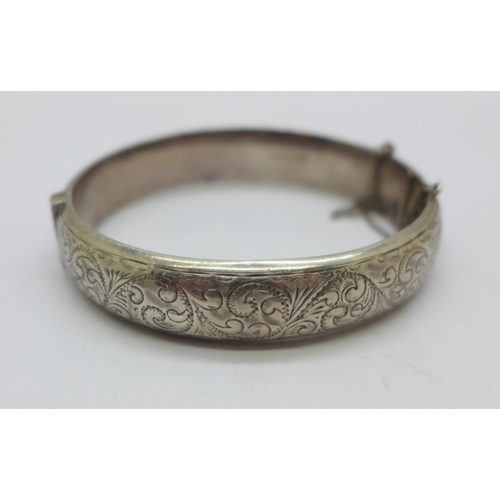 1196 - A hallmarked silver bangle, 21g