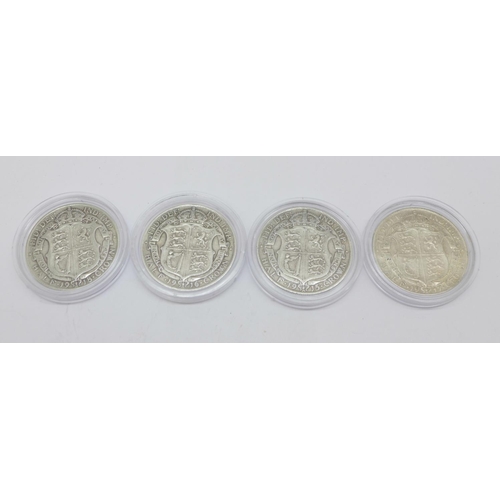 1203 - Four George V silver half crowns, 1915, 1916, 1917 and 1918