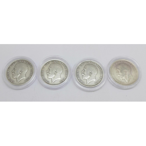 1203 - Four George V silver half crowns, 1915, 1916, 1917 and 1918