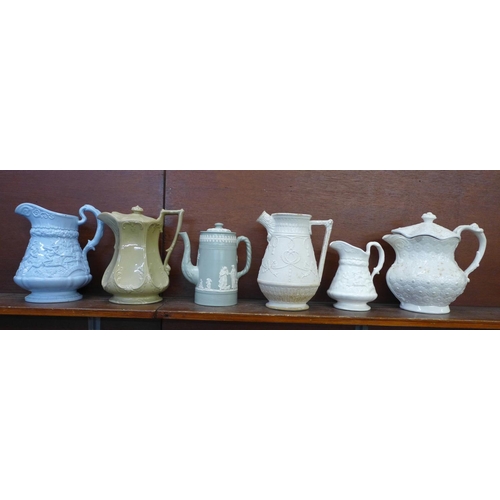 601 - Five 19th Century jugs including a Leeds Don Pottery relief moulded jug and cover, circa 1820-30, a ... 