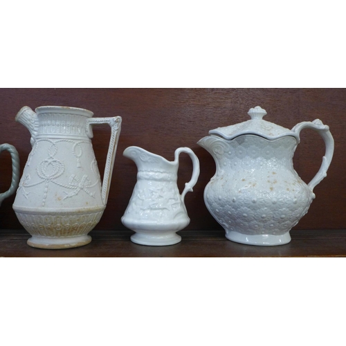 601 - Five 19th Century jugs including a Leeds Don Pottery relief moulded jug and cover, circa 1820-30, a ... 