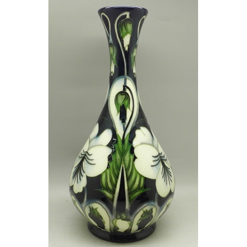 602 - A Moorcroft clematis vase, KW, 2003, second, 23cm (vase is heavily crazed)