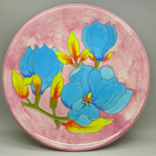 608 - A Moorcroft plate, 26cm