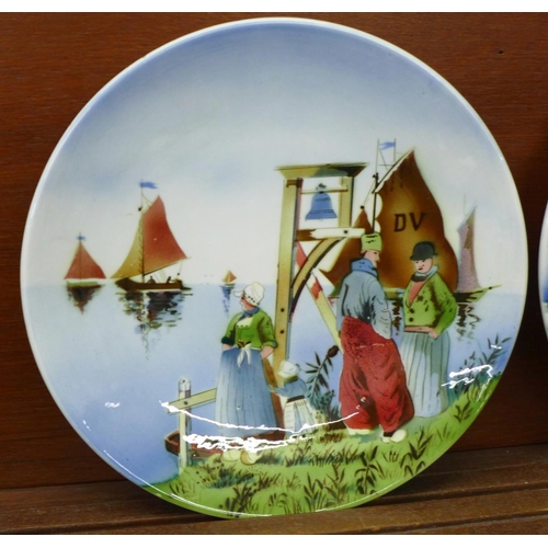 609 - A pair of Dutch scene plaques, marked made in Germany to verso, 30.5cm