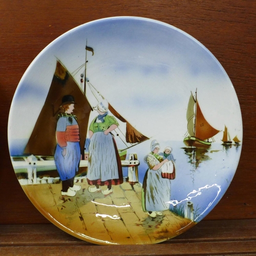 609 - A pair of Dutch scene plaques, marked made in Germany to verso, 30.5cm