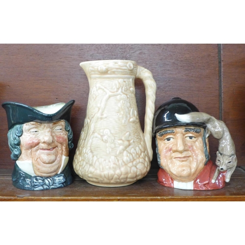 612 - Two Royal Doulton large character jugs, Gone Away and Parson Brown, and a relief moulded Art Deco ju... 